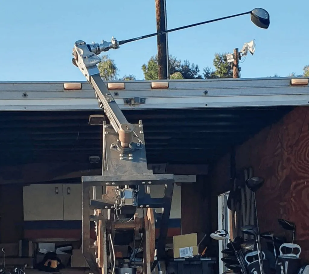 A robot from Golf Laboratories in San Diego testing a Golfyr club